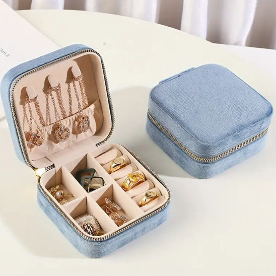 Boite a bijoux de voyage bleu élégante et pratique, parfaite pour garder vos bijoux bien organisés en voyage