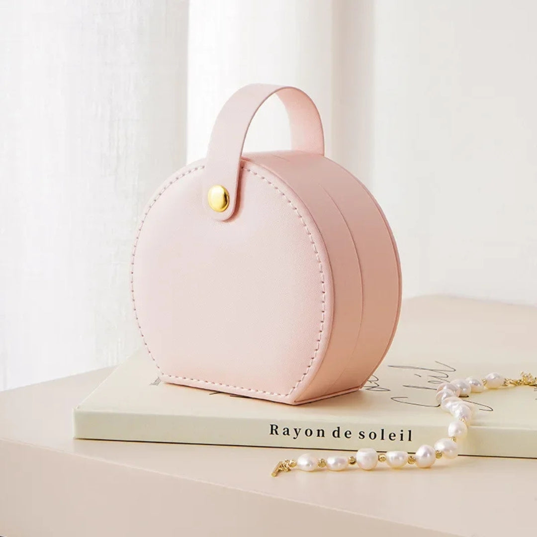 Boite à bijoux rose douce et féminine, parfaite pour voyager avec style