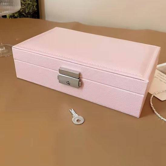 boite à bijoux rose sécurisée avec système de fermeture à clé