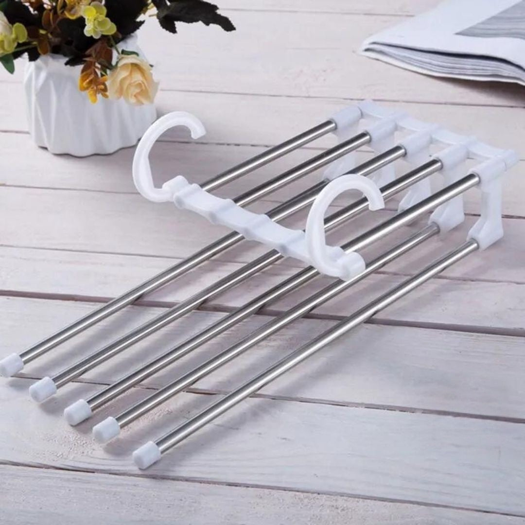 Cintre à pantalon blanc gain de place pour dressing lumineux