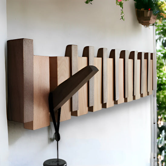 PatĂšre bois au design inspirĂ© dâun clavier de piano.