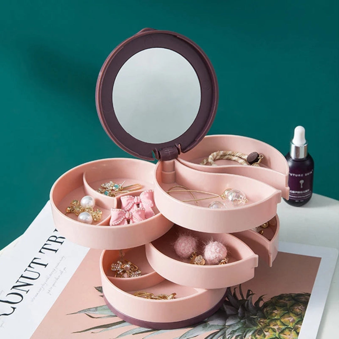 Boite a bijoux fille rose avec plateaux rotatifs, idéale pour ranger colliers, bagues et accessoires dans une chambre d’enfant