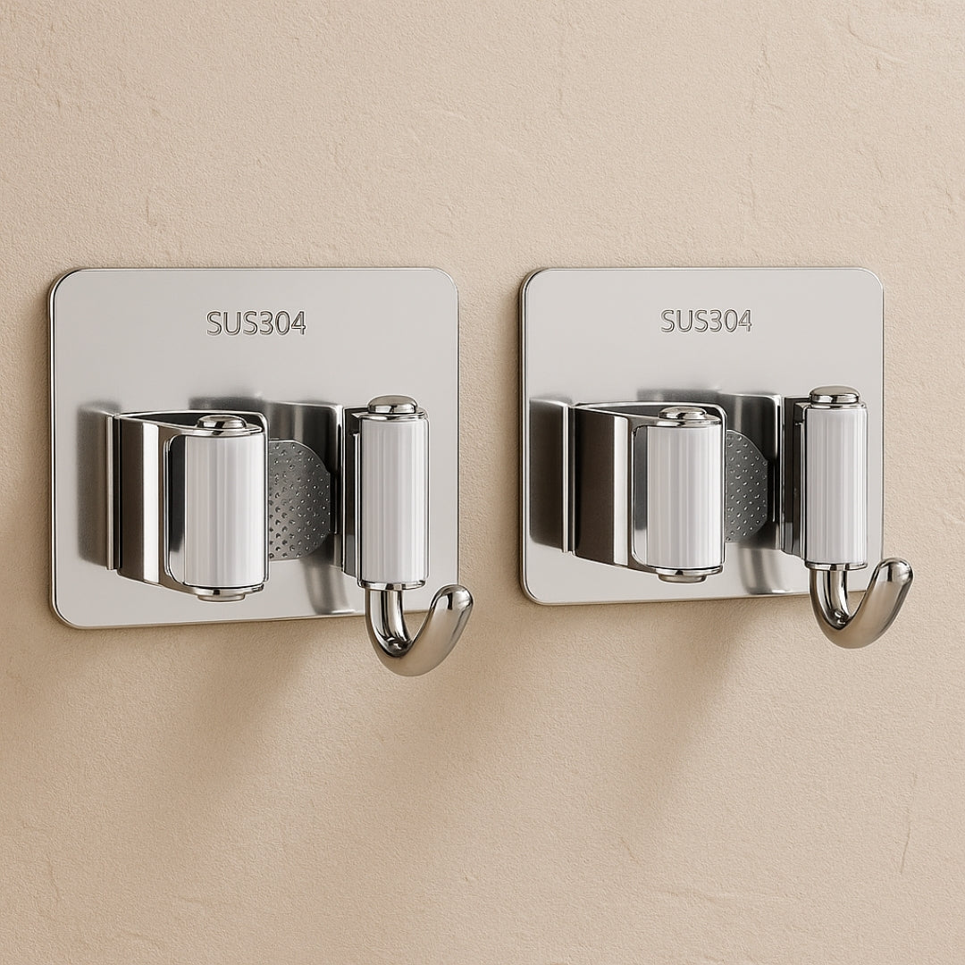 Deux crochets muraux argent sans perçage pour organiser les outils, fixation solide et espace optimisé avec style.