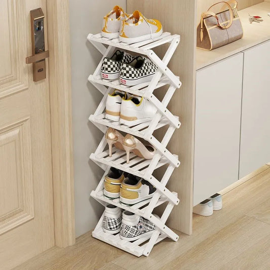 Etagere chaussure pliables en bambou naturel pour un rangement optimisé.

