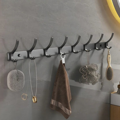 Patères murales noires avec 8 crochets pour un rangement optimal.