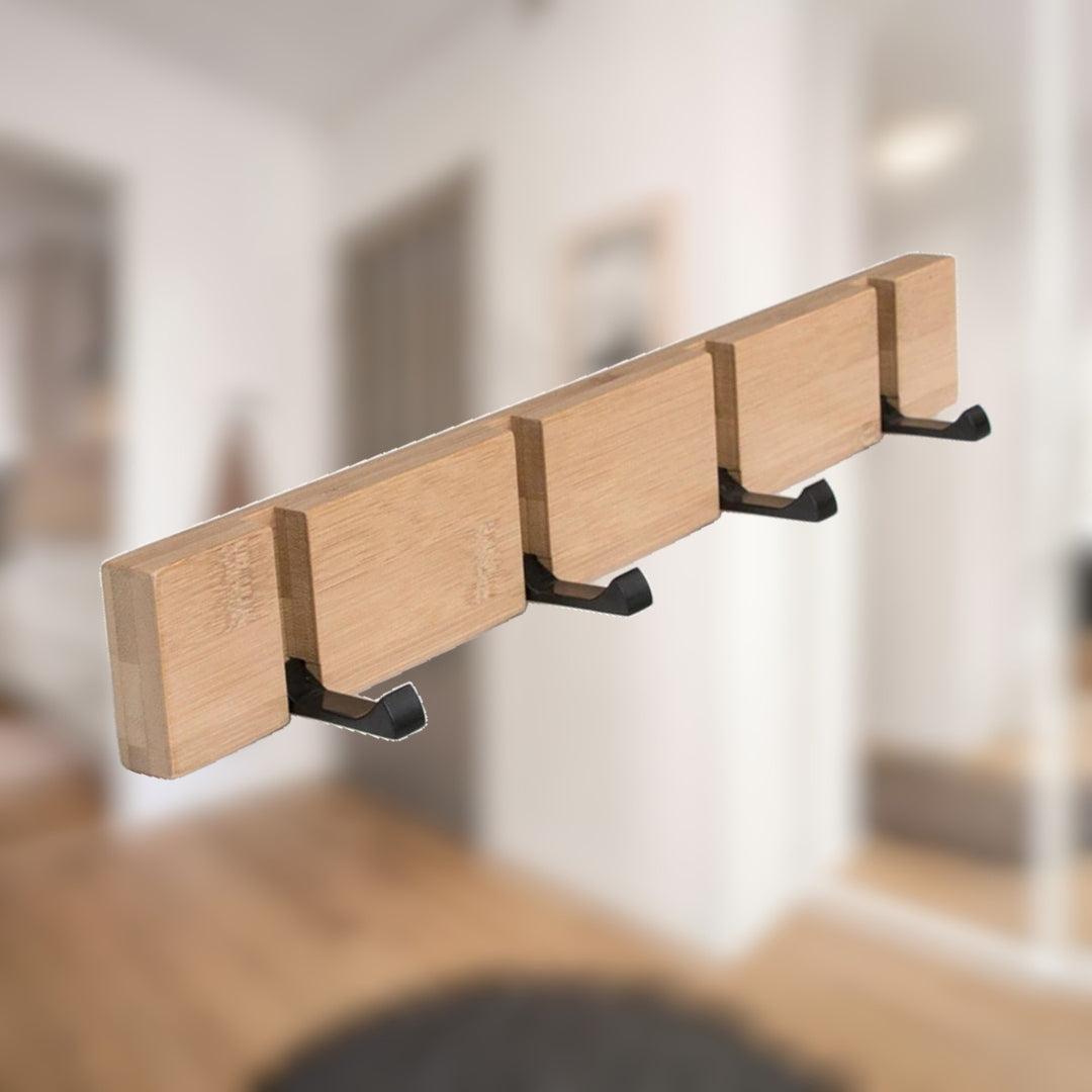 Ce porte manteau bois 4 crochets en bambou allie design naturel et praticité. Parfait pour les petits espaces à la recherche d’élégance et de gain de place.